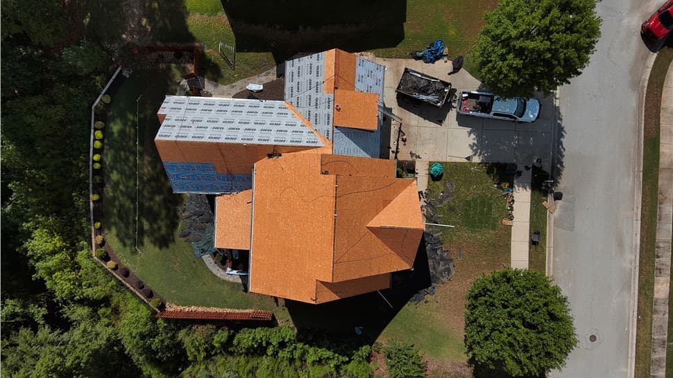 A newly installed roof on a suburban house.